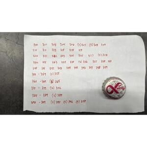 Set of 122 Lucky Lager Rebus/Puzzle Bottle Caps - Silver w/ Red Script